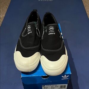 Adidas Black and White Slip-On Shoes